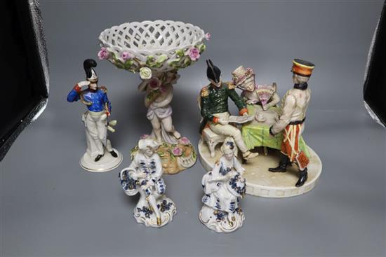 A Naples style figure of a soldier, a pair of Sitzendorf figures and a German centrepiece